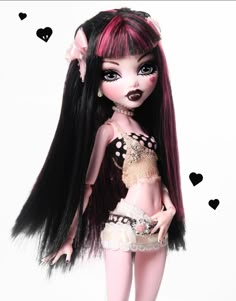 a doll with long black hair and pink eyes is posed in front of a white background