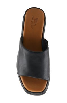 A subtle platform and chunky heel elevate a leather slide sandal fitted with a gore inset on cushioned footbed for optimal comfort. 2" heel; 1" platform Elastic gore inset Memory foam cushioning Leather upper and lining/synthetic sole Made in Turkey Comfortable Open Toe Platform Slides, Comfortable Leather Platform Slippers With Cushioned Footbed, Black Leather Footbed Platform Slide Slippers, Black Leather Slide Platform Slippers, Open Toe Synthetic Platform Slippers With Arch Support, Closed Toe Synthetic Slides With Ortholite Insole, Leather Open Toe Platform Slippers With Cushioned Footbed, Leather Open Toe Platform Slippers With Arch Support, Comfortable Slide Wedge Sandals With Removable Insole