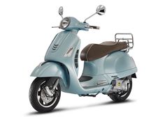 a light blue scooter is parked on a white background with no people around it