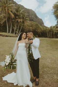 Intimate Hawaii Wedding in Kualoa Ranch | Hawaii Elopement | Hawaii Photographer | Retro Vibes | Film Wedding Photos | Fun Wedding Photo Ideas | Wedding inspo | Spring Colors | When it comes to planning your romantic wedding photos, your location is what sets the stage for a lifetime of memories! Tatiana and Christian decided to celebrate with a Kualoa Ranch spring wedding at their Paliku Gardens. Click this pin for more unique wedding photo ideas and book your destination wedding photographer! Hawaii Wedding Pictures, Lds Wedding Photos, Fun Wedding Photo Ideas, Kualoa Ranch Hawaii, Unique Wedding Photo Ideas, Paliku Gardens, Elopement Pictures, Elopement Hawaii