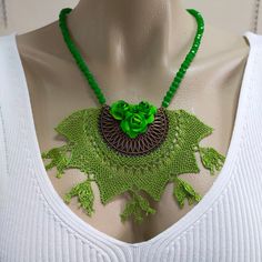 Ethnıc Jewelry,Women Necklace ,Tribal Jewelry,Green flower neclace Traditional Turkish Needle Lace Necklace,Green beaded necklace Crochet Lace Jewelry,Handmade Needle Lace Jewelry,Ethnic  LaceNecklace,Needle Lace Pendant,Oya Handcrafted Turkish Handmade Needle Lace Necklace Every piece is designed and handmade with love by me. For this listing; The length of the chain is 55 cm The width of the pendant is 12 cm The length of the pendant is 8cm I hope you like it too Thanks for looking at my handm Handmade Bohemian Choker Necklace, Bohemian Crochet Jewelry With Round Beads, Traditional Macrame Necklaces For Festivals, Handmade Bohemian Beaded Necklaces As Gift, Handmade Bohemian Beaded Pendant Necklaces, Bohemian Handmade Beaded Pendant Necklaces, Bohemian Beaded Choker Necklace As Gift, Handmade Green Bohemian Beaded Necklaces, Green Macrame Jewelry For Festival