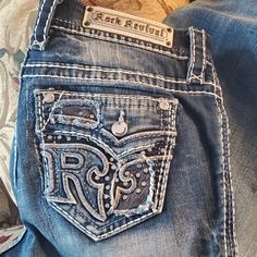 Rock Revival Easy Boot. Nwot. Size 32. Length 30 ...Make Me An Offer!! Mcbling Jeans, Upcycled Jeans, Customized Jeans, 2000s Outfits Aesthetic, Bejeweled Jeans Y2k, Y2k Dark Wash Flare Jeans, Rock Rival Jeans, Rock Revival Jeans Outfit, Rock Revival Jeans Outfit Y2k