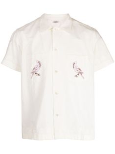 white cotton embroidered motif classic collar two chest patch pockets front button fastening short sleeves straight hem We've partnered with Good On You — an independent agency that rates how brands perform in relation to their impact on the planet, people and animals, with a multi-criteria rating simplified to a five points scale. In order to be awarded our conscious label, larger brands need to score a minimum of four out of five ('Good'), while smaller brands must score at least three out of five ('It's A Start'). This item comes from a brand rated three out of five ('It's A Start') by Good on You at the time it was added on FARFETCH. Please note, this is a brand-level rating and does not guarantee that this product is made with conscious materials. Learn more about what makes a product Short Sleeve Embroidered Shirt For Work, White Short Sleeve Shirt With Patch Pockets, Embroidered White Short Sleeve Camp Shirt, White Unstructured Cotton Camp Shirt, White Embroidered Short Sleeve Camp Shirt, Summer Collared Tops With Embroidered Logo, Unstructured White Cotton Camp Shirt, White Short Sleeve Tops With Patch Pockets, Spring Shirt With Patch Pockets And Short Sleeves