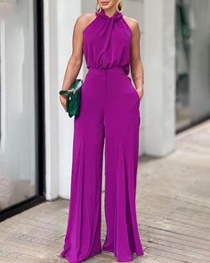 Loose Halter Neck Sleeveless Vest Wide Leg Pants JumpsuitCrowd: LadiesStyle: vacation styleSeason: summerFabric: 100% Polyestersize chart Size Length Chest Waist S 120cm | 47.2 in 96cm | 37.8 in 68cm | 26.8 in M 121cm | 47.6 in 100cm | 39.4 in 72cm | 28.3 in L 122cm | 48.0 in 104cm | 40.9 in 76cm | 29.9 in XL 123cm | 48.4 in 108cm | 42.5 in 80cm | 31.5 in XXL 124cm | 48.8 in 112cm | 44.1 in 84cm | 33.1 in 3XL 125cm | 49.2 in 116cm | 45.7 in 88cm | 34.6 in Elegant Sleeveless Strapless Jumpsuit For Beach, Non-stretch Wide Leg Jumpsuits For Beach, Non-stretch Wide Leg Jumpsuits And Rompers For Beach, Summer High Waist Solid Color Jumpsuits And Rompers, Sleeveless Non-stretch Solid Color Jumpsuits And Rompers, Halter Neck Jumpsuit For Vacation, Halter Neck Solid Color Jumpsuits And Rompers For Beach, High Waist Solid Jumpsuits And Rompers For Summer, Sleeveless Solid Color Summer Jumpsuits And Rompers