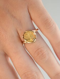 A beautiful coin ring with lots of vintage charm. The 18K coin sits in a 14K handmade mount accented with organic swirls and and curves, and was likely custom made for the original wearer. The band has wonderful buttery soft gold tones, while the coin has that extra pop of brightness thanks to the higher purity. "The Saint-Gaudens double eagle is a twenty-dollar gold coin, or double eagle, produced by the United States Mint from 1907 to 1933. The coin is named after its designer, the sculptor Au Vintage 14k Gold Coin Ring, Gold Coin Ring, Double Eagle, Gold Coin Necklace, Coin Ring, Gold Coin, Coin Necklace, Gold Coins, Vintage Charms