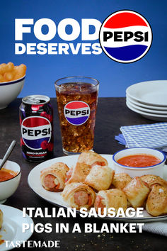 italian sausage pigs in a blanket is served with pepsi soda and hotdog buns