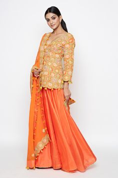 Orange short kurta with embroidered floral motifs. Comes with lehenga and dupatta.
Component: 3
Embroidery
Neckine: V neck
Sleeve Length: Three fourth
Fabric: Silk
Color: Orange
Zari trim detail on lehenga hem
Embroidered floral motifs on dupatta
Tassel detail on dupatta border and kurta hem - Aza Fashions Festive Orange Lehenga With Intricate Embroidery, Orange Embroidered Sets For Reception, Orange Anarkali Sets With Intricate Embroidery, Orange Sharara With Intricate Embroidery For Reception, Orange Saree Set With Intricate Embroidery, Orange Intricate Embroidered Sharara For Reception, Orange Embroidered Sharara For Reception, Orange Festive Set With Intricate Embroidery, Designer Orange Lehenga With Intricate Embroidery