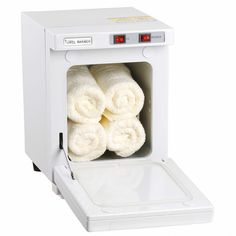 towels are placed in the small white machine