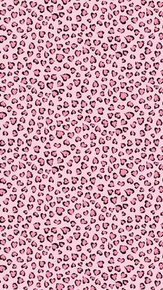 pink and black leopard print fabric with small spots on the top, as well as an animal