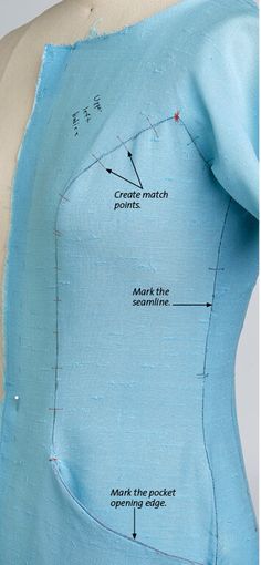 the back of a blue dress with instructions on how to sew and stitch it