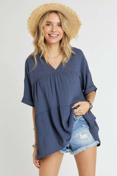 Get ready to live out your summer dreams in our playful and comfy tunic top! This solid and loose-fitting top features a trendy V-neck and tiered layers for a breezy and flowy look. With ruffled short sleeves and a floral print, this top is perfect for a casual day out. The front surplice hi-low design adds a touch of charm to this must-have piece. oversized (xl can do a large) 100% POLYESTER MADE IN USA Church Outfits, Loose Fitting Tops, Curvy Dress, Summer Dream, Back To School Outfits, Flowy Tops, School Outfits, V Neck Tops, Tunic Top