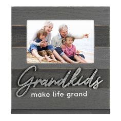 an old photo frame with the words grandkids make life grand written on it