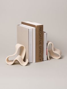 a bookend made out of two books sitting on top of each other