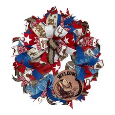 a red, white and blue wreath with the word welcome to texas written on it