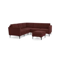 a red sectional couch with ottoman and footstool in front of a white background