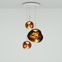 three lights hanging from the ceiling in a room with white walls and floor to ceiling lighting