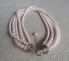 PREFERENTIAL POLICIES : The order is $50 or more.There will be a 10% discount.long-term effective. Please use the coupon code: CZH10 Welcome back to my shop: https://www.etsy.com/shop/pearlandjewelry Description of the product in the picture: The necklace is 18 inches long ,5 Strands glass Pearl Necklace, and I make them with 6mm and 8mm light pink glass pearls, This necklace included three layer 6mm and two layer 8mm light pink pearl. IT has a 2 inches long adjustable chain ,It is nice for your Pink Pearl Charm Necklace For Wedding, Pink Pearl Bridal Necklace Gift, Pink Pearl Bridal Necklace As A Gift, Wedding Pink Pearl Charm Necklace, Pink Round Bead Pearl Necklace For Wedding, Pink Round Beads Pearl Necklace For Wedding, Pink Pearl Necklaces For Wedding, Pink Pearl Necklace With Round Beads For Wedding, Handmade Pink Pearl Necklace For Wedding