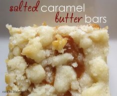 a close up of a piece of food on a white surface with the words salted caramel butter bars