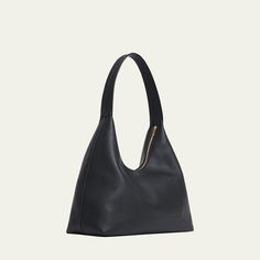 Mansur Gavriel "Candy" shoulder bag in leather and suede  Shoulder strap, 14.2" drop Zip top closure  Interior, one slip pocket  Approx. 10.4"H x 17.7"W x 7"D Made in Italy Modern Leather Shoulder Bag With Handle Drop, Structured Soft Leather Shoulder Bag For Everyday Use, Structured Leather Hobo Bag For Daily Use, Timeless Structured Leather Shoulder Bag, Versatile Evening Shoulder Bag With Leather Lining, Timeless Structured Shoulder Bag For Daily Use, Structured Leather Hobo Bag For Everyday Use, Modern Hobo Bag With Handle Drop For Business, Structured Soft Leather Bag For Everyday