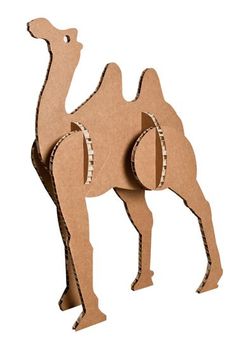 a cardboard cut out of a camel on a white background