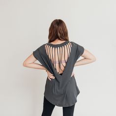 Fight to find yourself. This is your fitness journey! Features: Flowy athleisure top in light mauve and charcoal. Short cap dolman sleeves. Rounded neckline. Vertical stripe webbing cuts in a reverse triangle cutout on the back of shirt. Front hem is thicker and shorter than back hem. Fits true to size. Model in mauve is wearing a 1X. She is 5'9". Model in charcoal is wearing a small and is 5'1". Measurements: Length Bust S 29" 46" M 29" 48" L 30" 50" 1x 30" 52" 2x 31" 54" 3x 31" 56" *Measuremen Tiered Dresses, Fitness Top, Light Mauve, Athleisure Tops, Spring Fits, Rounded Neckline, Dolman Sleeve, Floral Maxi Dress, Jeans Dress