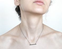 "This edgy line necklace made of sterling silver. The dainty bar necklace has a modern and minimalistic elegant look. This listing is for horizontal bar necklace that you see on the 1st picture or a vertical bar like on the 2nd and 3rd picture Measurements for horizontal necklace: Bar pendant width is 1.5 mm =0.05\". Bar length is 3 cm. = 1.18\" Measurements for vertical bar necklace: Bar pendant width is 1 mm =0.04\". Bar length is 4 cm. = 1.57\" The chain has a silver lock. You can choose from Dainty Bar Necklace, Minimalist Jewelry Silver, Staple Earrings, Horizontal Bar Necklace, Modern Silver Jewelry, Cheap Silver Rings, Vertical Bar Necklace, Modern Necklace, Board Pin