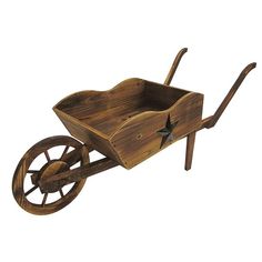 an old wooden wheelbarrow with stars on it