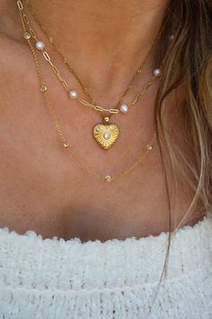 Gold Plated Heart Charm Necklace Length of Necklace: approx. 16 - 18 inches (adjustable) Gold plated Stainless Steel Heart Pendant Locket Necklace With Adjustable Chain, Adjustable Heart Shaped Clavicle Chain Necklaces, Valentine's Day Choker Necklace With Adjustable Chain, Adjustable Heart Pendant Necklace With Locket, Adjustable Heart Pendant Locket Necklace, Gold Heart Beads Choker Necklace, Adjustable Locket Necklace For Valentine's Day, Heart Shaped Adjustable Delicate Chain Necklace, Adjustable Heart-shaped Delicate Chain Necklace