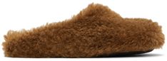 Shearling slippers in brown. · Logo-embossed leather footbed · Rubber sole Supplier color: Caramel Shearling Slippers, Faux Fur Slippers, Fur Slippers, Curator Style, Slide Slipper, Luxury Streetwear, Embossed Leather, Faux Fur, Loafers