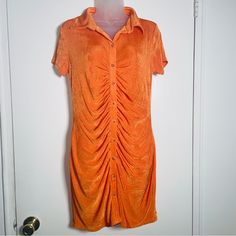 Introducing A Stunning Women's Dress From Wild Fable In A Vibrant Orange Color. This Dress Is Perfect For Casual Occasions And Comes In Size M. It Has Short Sleeves And A Short Length Of 34 Inches, Making It Perfect For The Summer And Spring Seasons. The Dress Is Made Of A Combination Of Polyester And Spandex, Making It Stretchy And Comfortable To Wear. It Features A Solid Pattern And A Chest Measurement Of 29.5 Inches. This Dress Is A Great Addition To Any Wardrobe And Is Sure To Make You Stand Ruched Short Sleeve Dresses, Womens Plaid Dress, Dresses Orange, Cream Mini Dress, Long Sleeve Ruffle Dress, Velvet Bodycon Dress, Striped Bodycon Dress, Floral Slip Dress, Tropical Dress