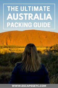 a woman standing in front of a mountain with text overlay reading the ultimate australia packing guide