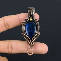 Handmade Copper Chain Size 18-20Inch - https://www.etsy.com/in-en/listing/1162990726 Blue Flash Labradorite Gemstone Copper Wire Wrapped Handmade Pendant Gemstone : Blue Flash Labradorite  Pendant Length : 7.5 CM Metal : Copper * Protection:- Copper will be tarnished after a while so try to limit contact with lotions, soaps or anything moist and never wear it in the shower, swimming or anywhere else it may come in contact with water. If tarnish becomes an issue, you may clean this item with jewe Wire Wrapped Labradorite Teardrop Jewelry, Blue Copper Wire Wrapped Necklace, Blue Labradorite Wire Wrapped Jewelry, Bronze Wire Wrapped Labradorite Necklaces, Unique Labradorite Teardrop Pendant Jewelry, Jewelry Cleaning, Diy Jewelry Inspiration, Labradorite Jewelry, Jewellery Inspiration