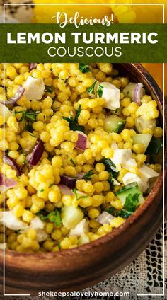 a wooden bowl filled with corn and onions