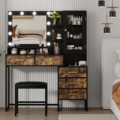 a bedroom with a vanity, mirror and stool next to a bed that has lights on it