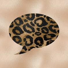 an image of a cheetah pattern with the letter q in it's center