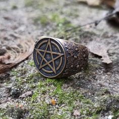 The ring is based on pentacle (pentagram) it`s the magic symbol used in wiccan (wicca), occult and other druid and pagan beliefs based on powers of nature. The ring is made by hand casting. Oak leaves and acorns on the sides of signet ring. If you like goth, witchy and witchcraft jewelry - you like this item. Weight (depends on size): +/- 17 gm or 0.6 oz ! The ring transports in a wooden box ! Pentacle Ring, Pagan Beliefs, Greek Mythology Jewelry, Mythology Jewelry, Mjolnir Pendant, Goth Accessories, Bracelet Viking, Wiccan Magic, Viking Pendant