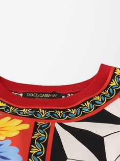 This round neck blouse crafted from silk by Dolce & Gabbana features a colorful patchwork baroque top with delicate floral print. Perfect for any special occasion, timeless piece is sure to become wardrobe staple. Round Neck Blouse, Leg Work, Round Neck Tops, Beautiful Embroidery, Printed Blouse, Card Wallet, Timeless Pieces, Wardrobe Staples, Dolce And Gabbana