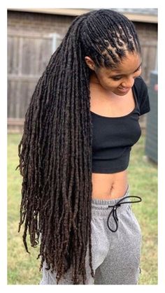 Black Woman with long dreadlocks. Women With Long Locs, Short Dreadlock Styles, Jet Black Locs, Locs Hairstyles For Women Long, Long Loc Styles Women, Long Locs Black Women, Long Dreads Styles For Women, Locs Growth, Dreadlocks Black Women