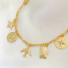 "⭐️Item Details: Length: 7\" Link Width: 3mm Charms Width Average: 15mm Material: 18k Gold Filled Benefits: Water & Tarnish Resistant, Hypoallergenic, Lightweight ⭐️About Our Bracelets: Our bracelet collection is made to easily blend with your style. In it you will find causal, yet flattering pieces that can be easily matched with others of different colors, patterns, and widths to create a beautiful statement wherever you go. Don't be afraid to experiment and combine them with other collect Gold Filled Charm Bracelet, Gold Charm Bracelet As A Souvenir, Charm Bracelet Aesthetic, Jewelry Packaging Diy, Travel Charm Bracelet, Travel Bracelet, Custom Charm Bracelet, Dream Things, Travel Charms