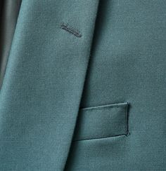 Elegant Green Outerwear With Hidden Button Closure, Green Tuxedo Blazer For Work, Green Notch Lapel Blazer With Pressed Crease, Elegant Green Suit With Pressed Crease, Elegant Green Blazer With Lapel Collar, Formal Green Blazer With Pressed Crease, Elegant Green Formal Outerwear, Elegant Formal Green Outerwear, Elegant Green Three-piece Suit With Long Sleeves