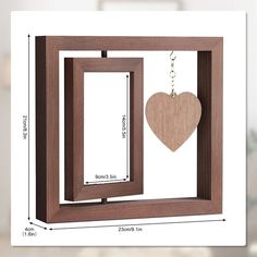 a wooden frame with a heart hanging from it's side and measurements for each piece