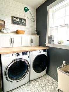 a washer and dryer in a small room