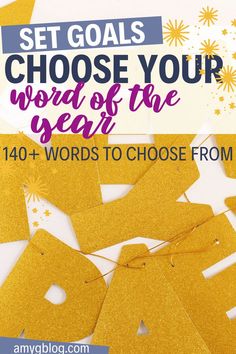 the words set goals to choose your word of the year are shown in gold glitter