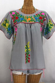 My new favorite selfie-shirt!  Our "La Lijera" Embroidered Peasant Blouse Mexican Style in Grey with Rainbow Embroidery.  Check out all of our emboidered blouses at http://www.sirensirensiren.com/new!-embroidered-peasant-tops  #boho Bright Rainbow