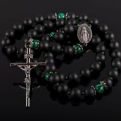 "This catholic gemstone rosary with a natural black shungite and green rhinestone will be a great religious gift for a men, pastor or godchild. Do you look for a gift to a close friend for a birthday or or give a favorite amulet? Then you just need Shungine Rosary. These shungite catholic rosaries are simply necessary for people who are looking for mutual love, as well as for those who want to achieve career growth. This kind of unisex product can be a wonderful present for a representative of a Adjustable Black Rosary With Cross, Adjustable Black Cross Rosary, Adjustable Black Spiritual Rosary, Black Cross Jewelry With 8mm Beads, Black Cross Rosary As Gift, Handmade Black Rosary Bracelet For Gift, Handmade Black Rosary Bracelet Gift, Black Gothic Jewelry With 8mm Beads, Black Crucifix Rosary Bracelet As Gift