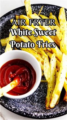 air fryer white sweet potato fries on a plate with ketchup and mustard