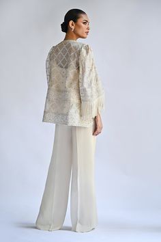 Monet – Sania Maskatiya International Elegant Tassel Sets For Reception, Chic Sets For Spring Reception, Chic Spring Reception Sets, Chic Spring Festive Blazer, Chic Festive Spring Blazer, Elegant Long Sleeve Outerwear With Fringe, Festive Chic Spring Blazer, Elegant Fitted Fringe Outerwear, Chic Party Outerwear With Tassels