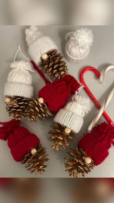 knitted hats and pine cones with candy canes