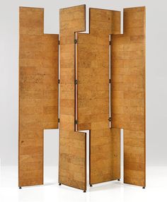 a room divider made out of wood with four sections on each side and one section closed