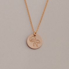 "14k gold filled chain - 16\" disc - 1/2\" We hand-stamp our necklaces in Utah. They are handmade and the designs are original and created by us! This necklace is gold-filled, which means it will never tarnish or fade and it will always look shiny and beautiful! Check out our shop for more birth flower necklaces and many other designs!" Rose Gold Birth Flower Necklace, Delicate Hand Stamped Gold Jewelry, Everyday Gold Flower Necklace, Gold Nickel-free Flower Pendant Necklace, Elegant Poppy Colored Jewelry Gift, Gold Flower Charm Necklace For Mom, Gold Flower Charm Necklace As Gift For Mom, Gold Flower Necklace With Charm As Gift For Mom, Gold Birth Flower Necklace Gift For Her